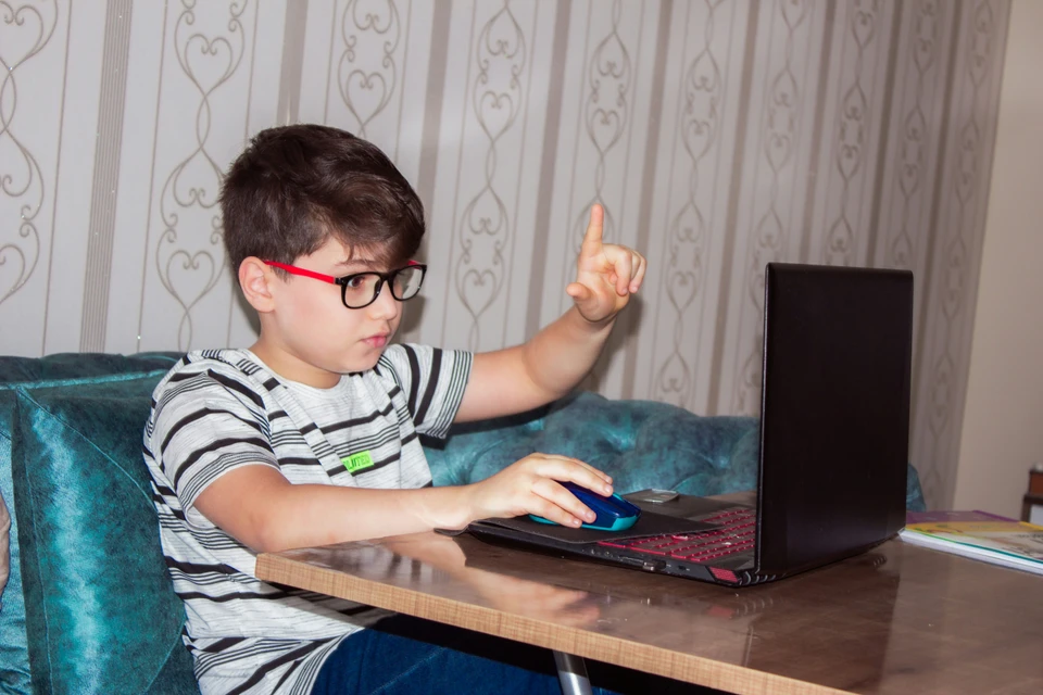 Kid on computer